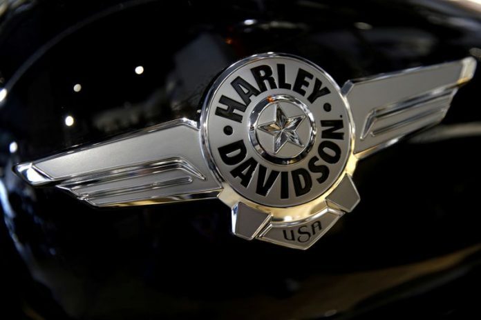 FILE PHOTO: The logo of U.S. motorcycle company Harley-Davidson is seen on one of their models at a shop in Paris