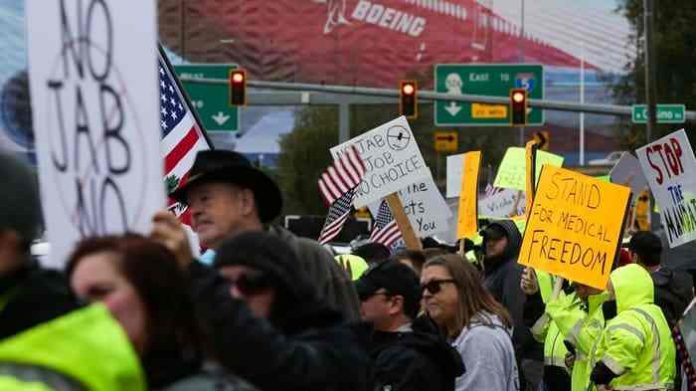 Boeing workers stage protest over vaccine mandate Boeing workers stage protest over vaccine mandate