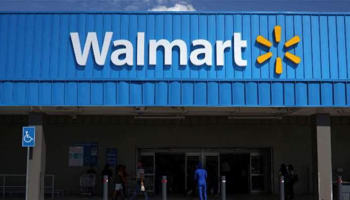 Walmart cuts paid leave in half for COVID- 19 positive workers Walmart cuts paid leave in half for COVID- 19 positive workers