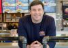 A company buys lottery tickets for 50000 employees