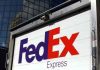 FedEx to close stores, put off hiring as demand slumps