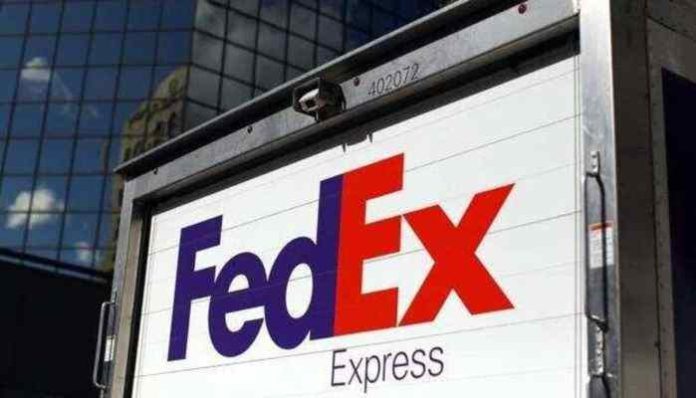 FedEx to close stores, put off hiring as demand slumps